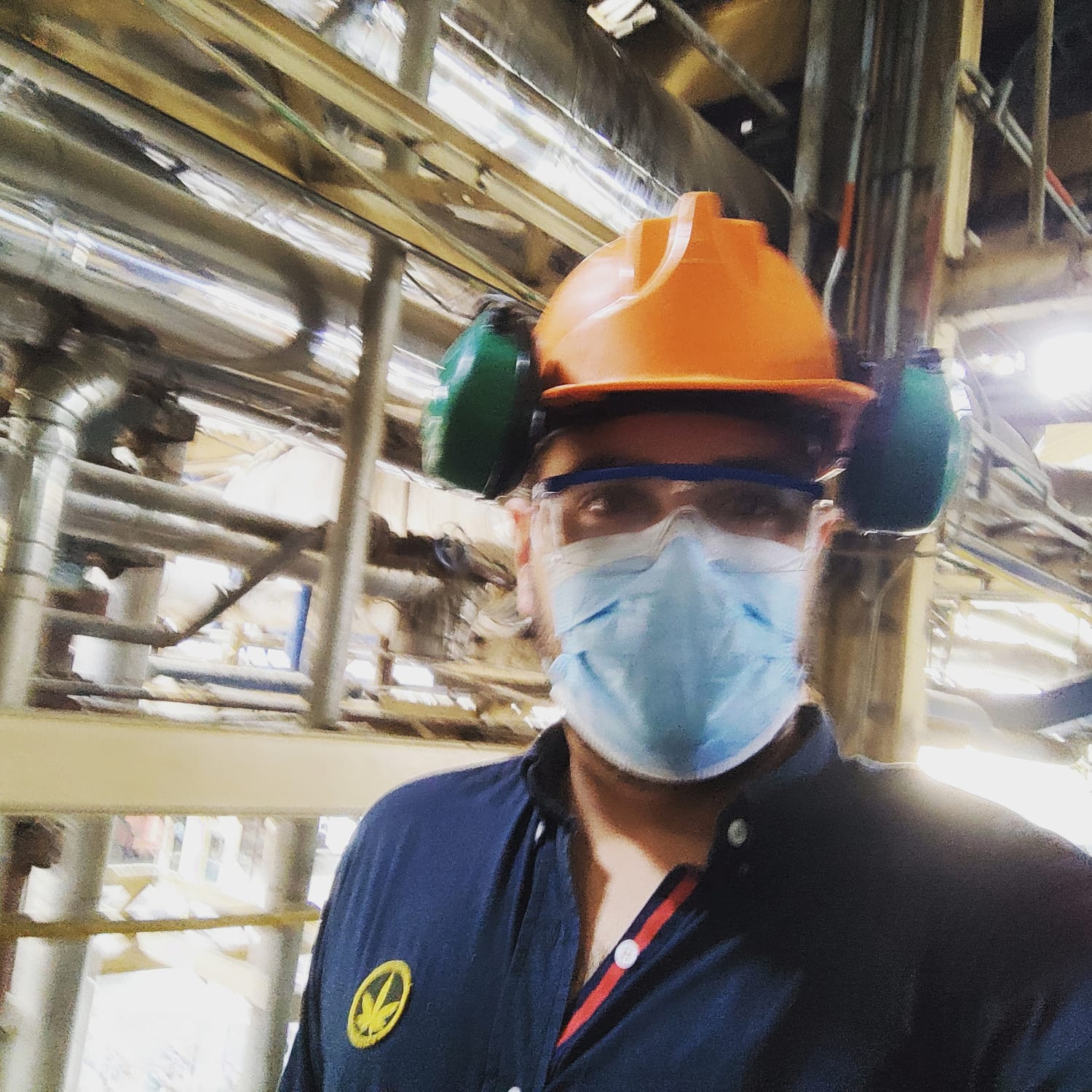 Industrial plant operation in full PPE.